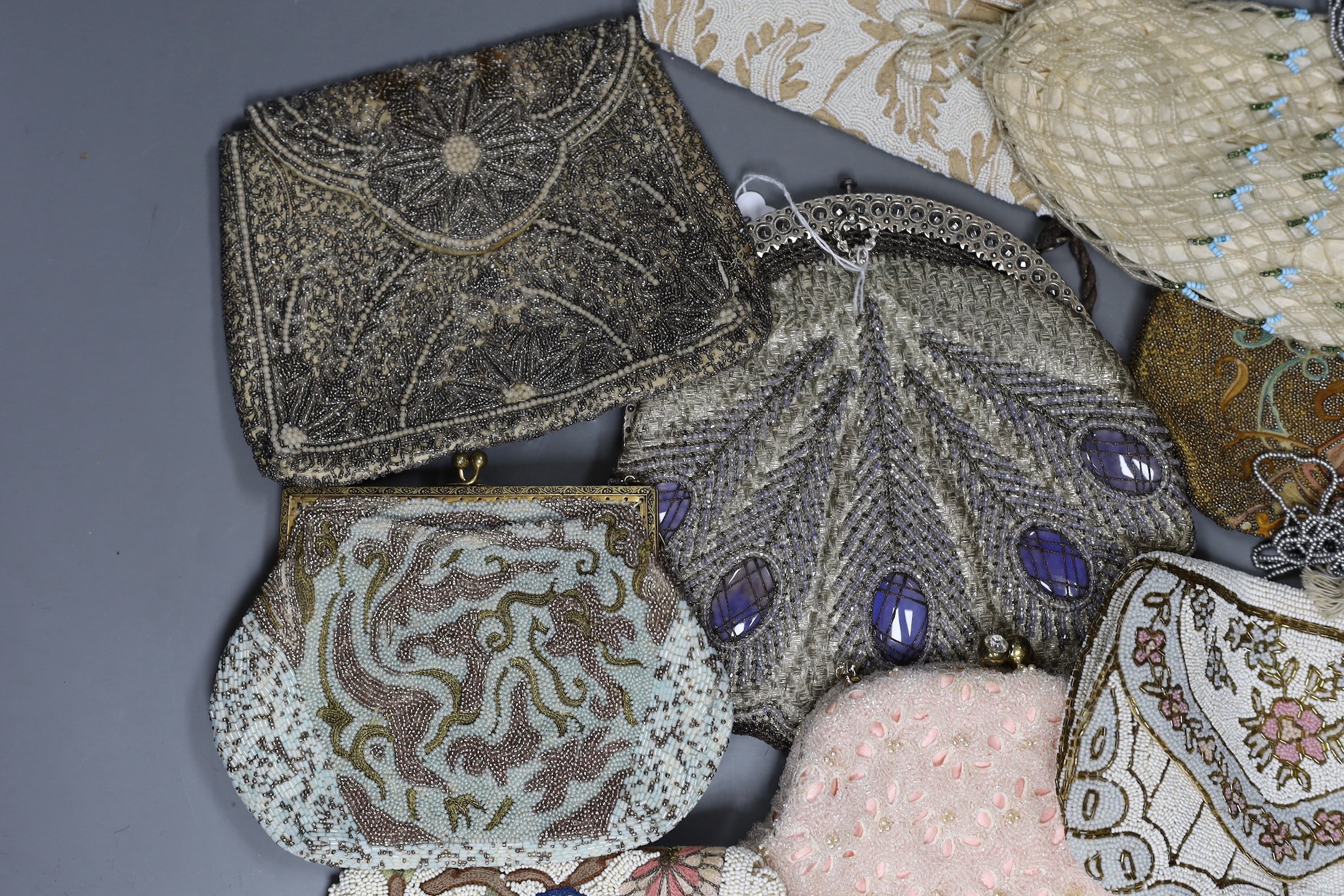 Nine mixed late 19th century to mid 20th century multicoloured bead worked and embroidered evening bags